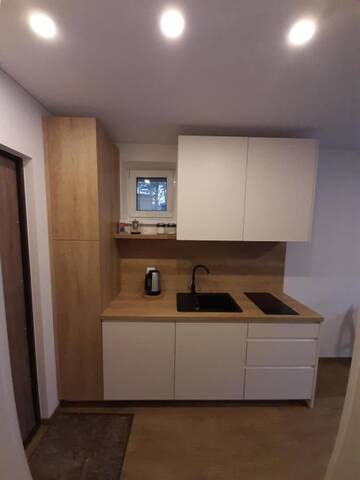Фото номера Двухместный номер с 1 кроватью и балконом Гостевой дом Kalno namai - apartamentas Juodkrantėje г. Юодкранте 4
