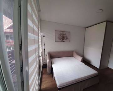 Фото номера Двухместный номер с 1 кроватью и балконом Гостевой дом Kalno namai - apartamentas Juodkrantėje г. Юодкранте 3
