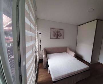 Фото номера Двухместный номер с 1 кроватью и балконом Гостевой дом Kalno namai - apartamentas Juodkrantėje г. Юодкранте 8