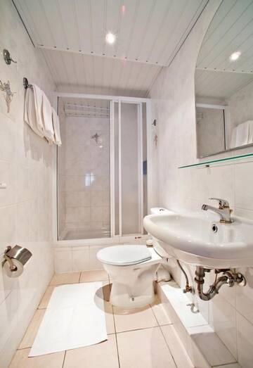 Фото номера Семейный номер Отель Vila Flora г. Юодкранте 3