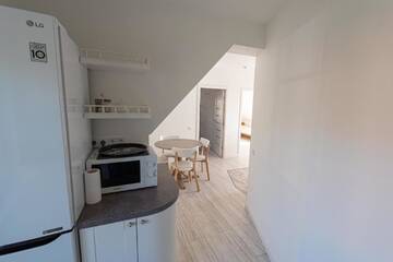 Фото номера Апартаменты с 2 спальнями, вид на Куршский залив Апартаменты Neringarent Apartamentai г. Юодкранте 11